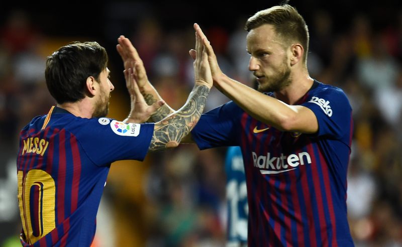 Messi e Ivan Rakitic do Barcelona