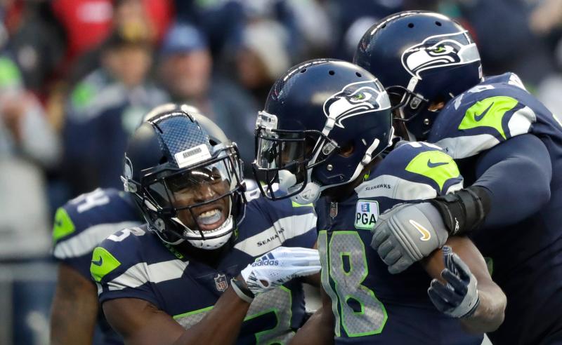 Jaron Brown e colegas dos Seattle Seahawks