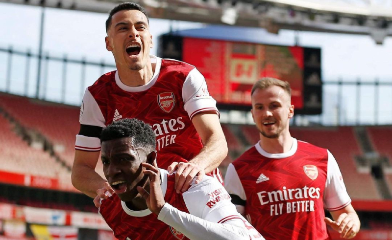 Time do Arsenal celebra Gol EPL